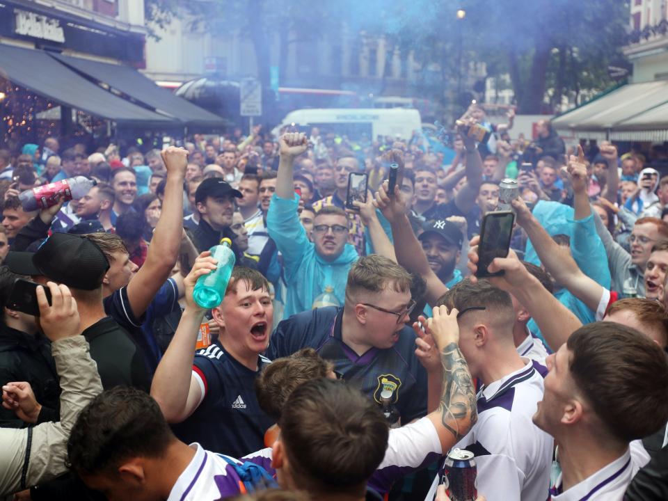 Scotland fans gather in Leicester Square shortly before kick off (PA)