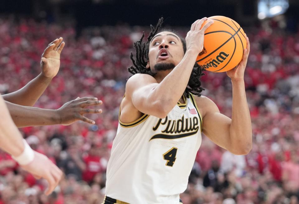 Purdue Boilermakers forward Trey Kaufman-Renn (4) drives to the basket during the NCAA Men’s Basketball Tournament Final Four game against the North Carolina State Wolfpack, Saturday, April 6, 2024, at State Farm Stadium in Glendale, Ariz.