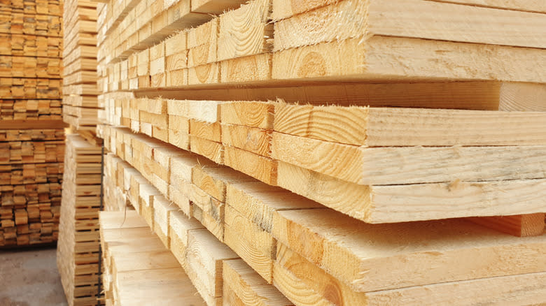 Piles of lumber drying in a warehouse