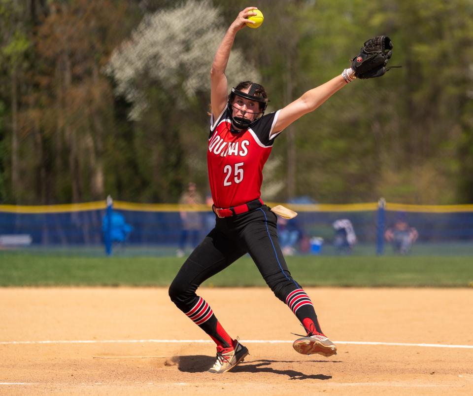 St. Thomas Aquinas' Hayley Wieczerzak (25) pitches the ball against Metuchen on Saturday, April 15 afternoon at the field at Metuchen High School.