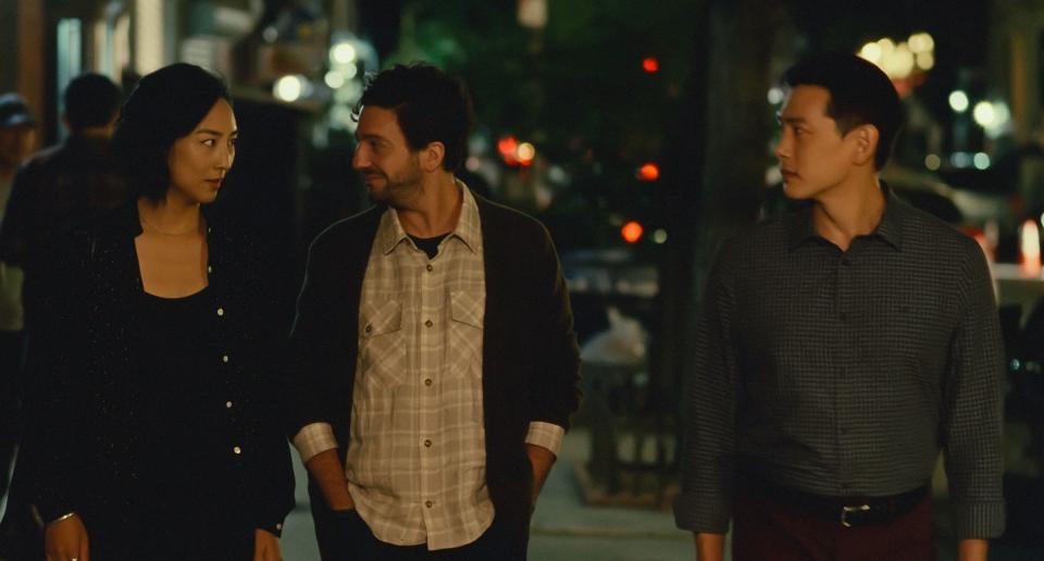 Nora (Greta Lee), Arthur (John Magaro), and Hae Sung (Teo Yoo) stroll through the East Village.<span class="copyright">Courtesy of A24</span>