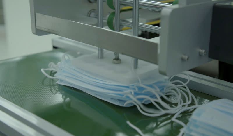 Still image from video of Razer's face mask production line in Singapore