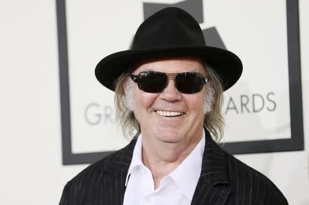 Neil Young arrives at the 56th annual Grammy Awards in Los Angeles, California January 26, 2014. REUTERS/Danny Moloshok