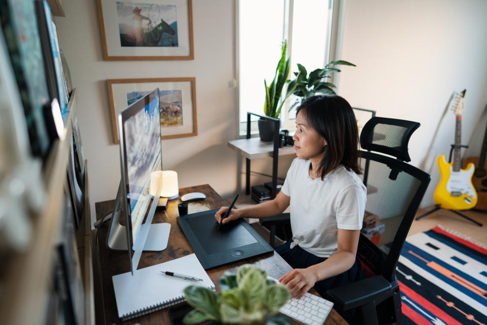 Female designer working from her home office. Okayama, Japan.