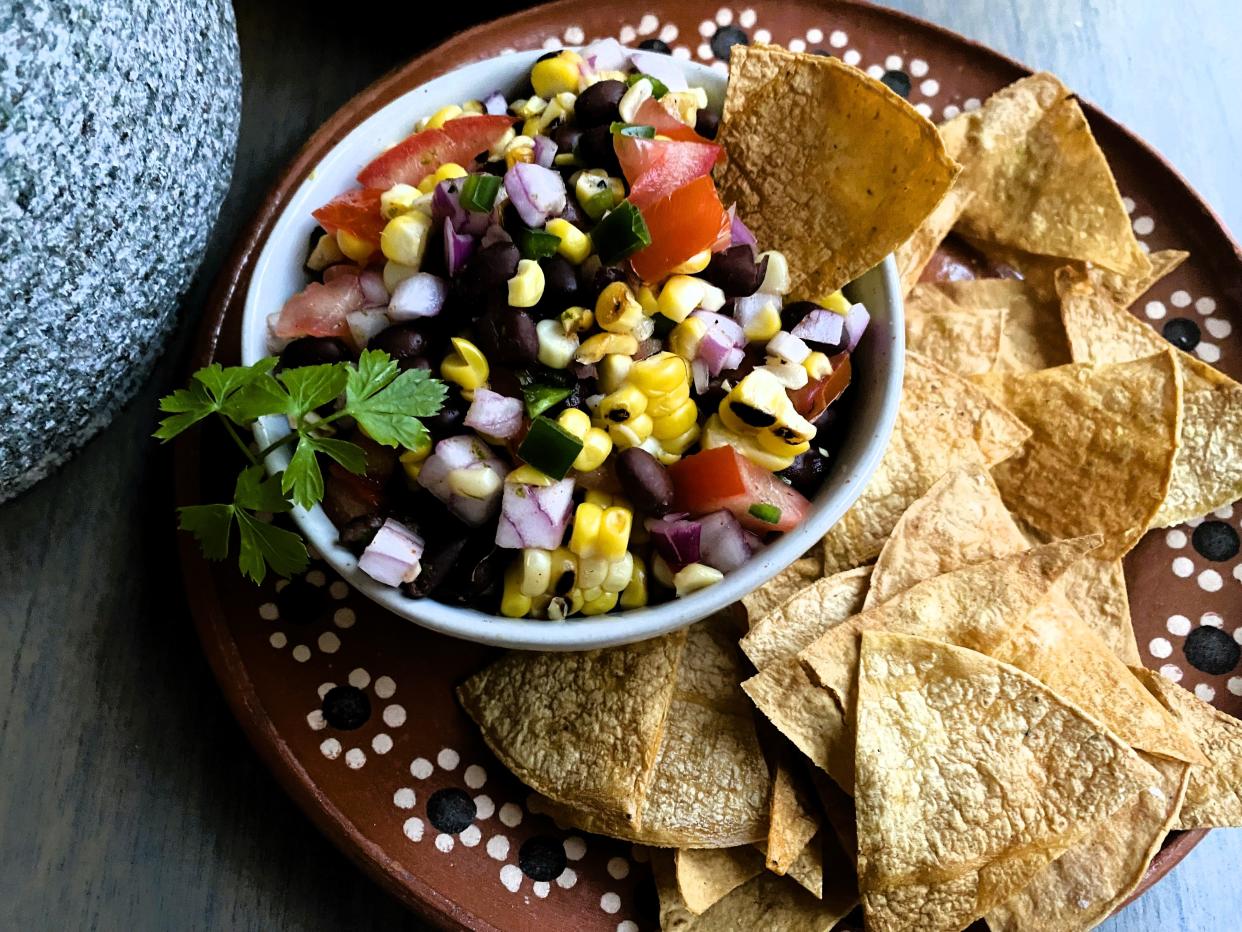 Grilled Corn Salsa is economical, and super easy to put together. The homemade tortilla chips are also quick to make and are a game changer, allowing us to taste the true flavor of the corn tortilla.