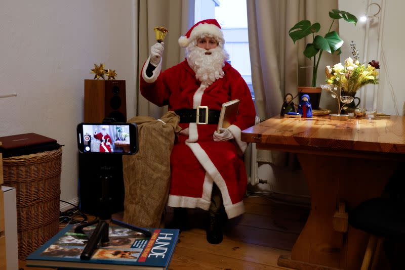 The Wider Image: Christmas wishes from Santas around the world