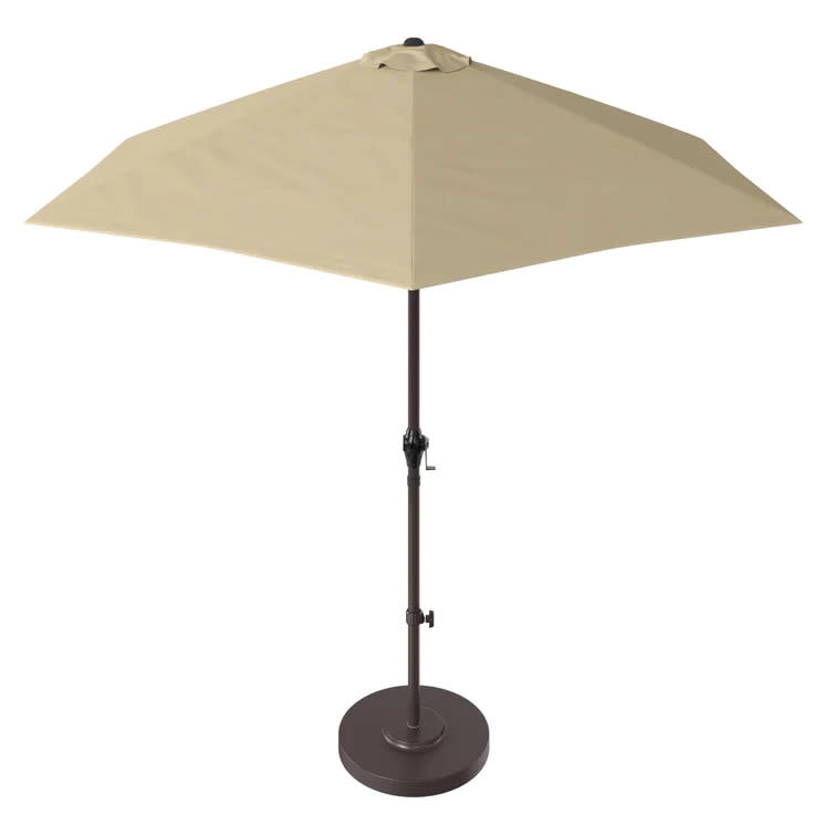 Save up to 52% on the Freeport Park 108'' Market Umbrella. Image via Wayfair.