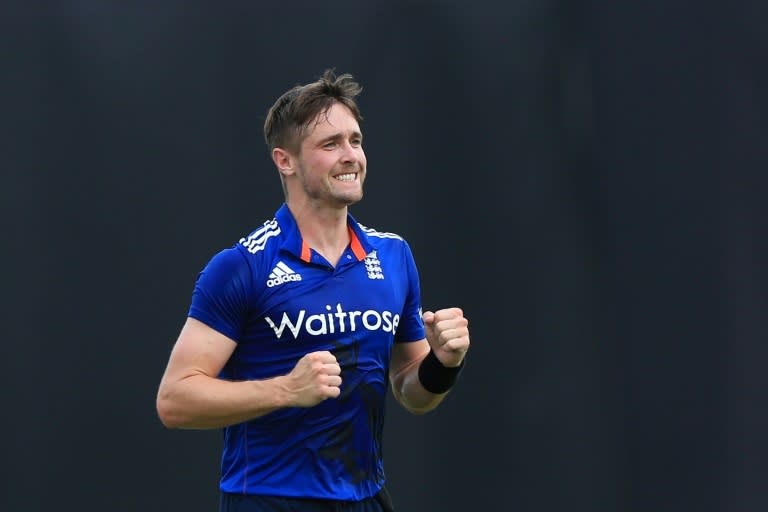 Chris Woakes cheers after dismissing Imrul Kayes in Dhaka on October 9, 2016