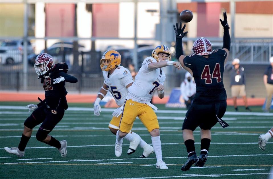 La Serna linebacker Adrian Castro (44) tries to knock down a pass by Grant quarterback Luke Alexander in Division 2-AA game.