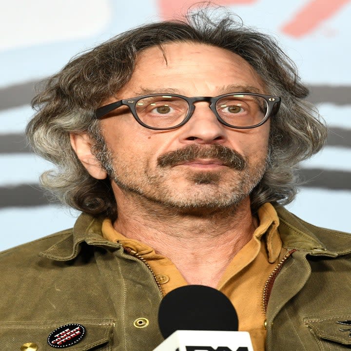 Marc Maron with a microphone