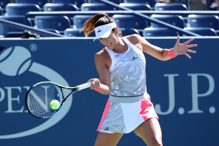 Aug 29, 2016; New York, NY, USA; Garbine Muguruza of Spain returns a shot to Elise Mertens of Belgium on day one of the 2016 U.S. Open tennis tournament at USTA Billie Jean King National Tennis Center. Anthony Gruppuso-USA TODAY Sports