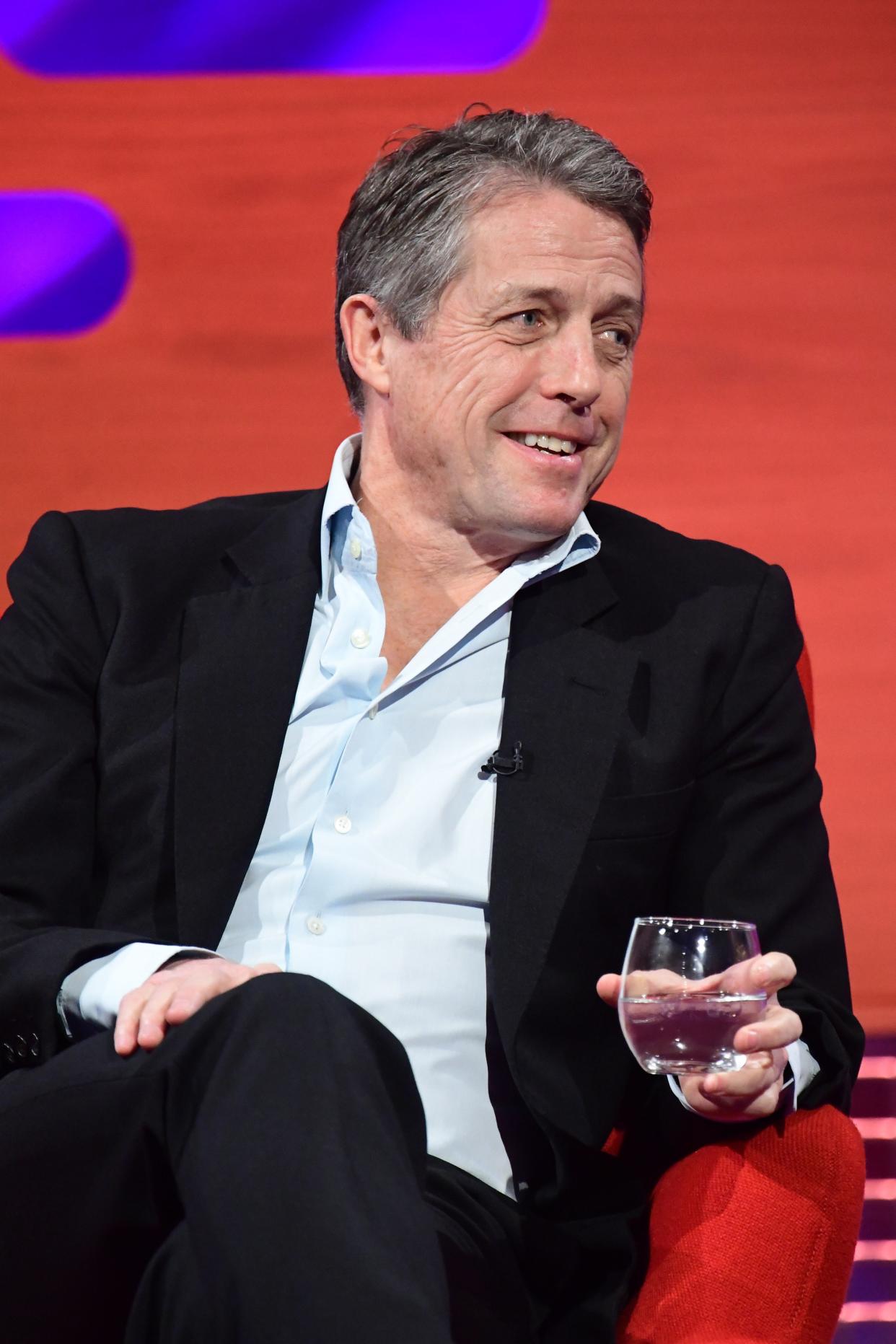 Hugh Grant is among the list of stars confirmed to have been invited to a state dinner with King Charles tonight in Paris (PA Archive)