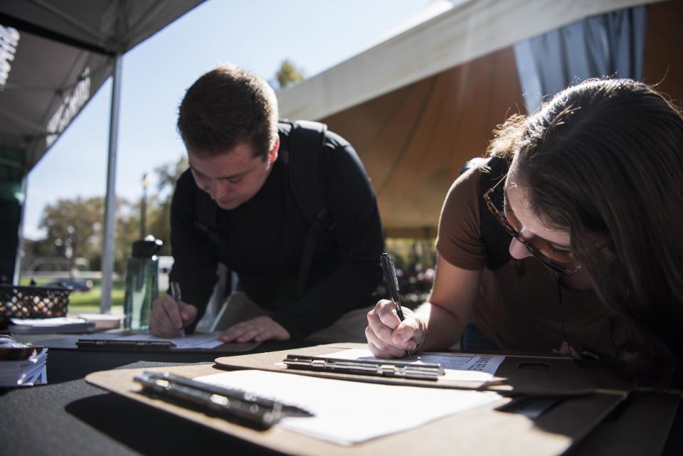 Trace Ledgard and Kristen Gugerli sign up to be interviewed.