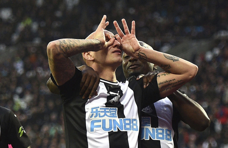 Newcastle United's Jonjo Shelvey celebrates scoring against West Ham United during the English Premiership League soccer match at The London Stadium, London, Saturday Nov. 2, 2019. (Daniel Hambury/PA via AP)