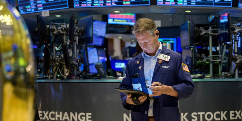 Traders work on the floor of the New York Stock Exchange (NYSE) during the opening bell in New York City on May 23, 2023.