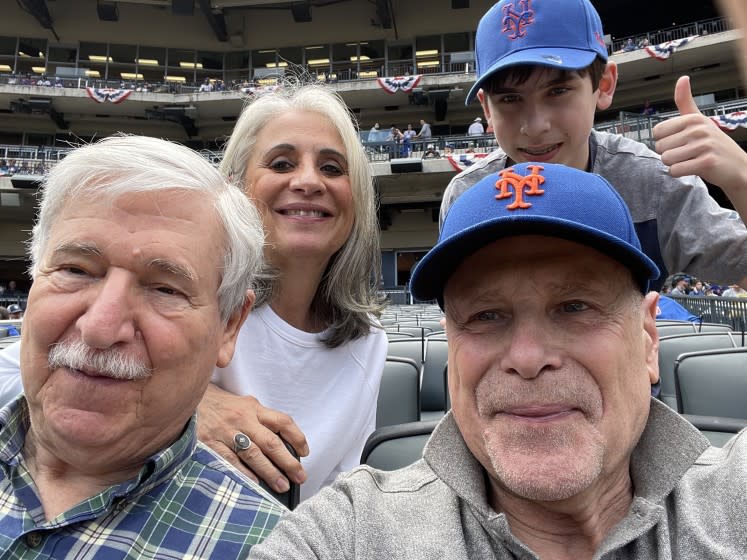 Citifield NEW YORK, NY APRIL 10, 2021-(l to r) Returned Iranan Hostage John Limbert, Barbara Rosen, returned Iran hostage Barry Rosen and John Limbert's 14 year old grandson Otto, met during a capacity-restricted game in a pandemic, teh Mets lost to the miami marlins 3 - 0 .