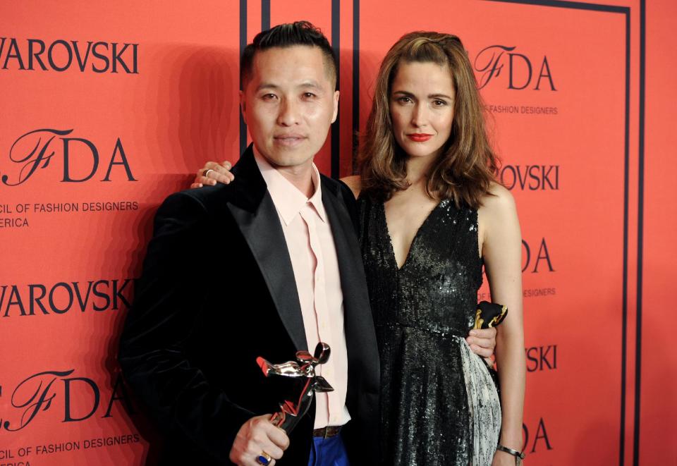 Accessories Designer of the Year honoree Phillip Lim, left, and actress Rose Byrne pose in the press room at the 2013 CFDA Fashion Awards at Alice Tully Hall on Monday, June 3, 2013 in New York. (Photo by Evan Agostini/Invision/AP)