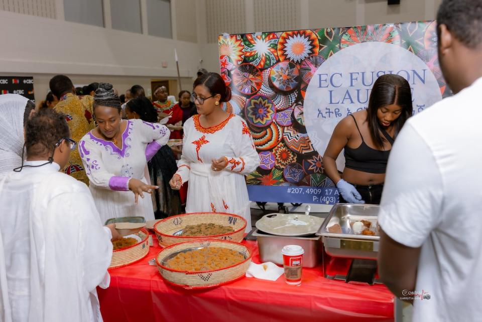 Two restaurants teamed up to share food common to many Eritrean and Ethiopian cultures at the Sharing Knowledge event — Haniel Breakfast House (left) and EC Fusion Lounge. MJ's African Food Store and the Central Halal Kitchen also fed the crowds.