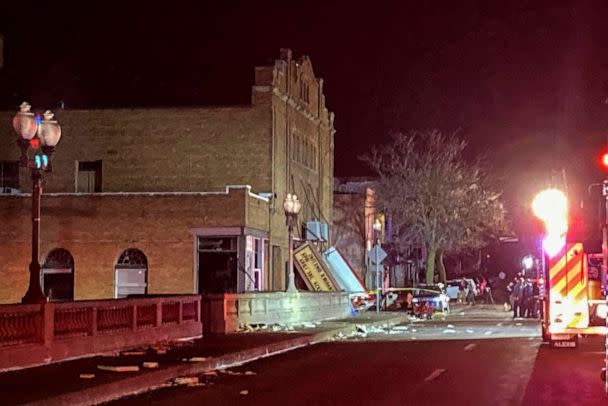 PHOTO: The fallen marquee is seen at the front entrance of the Apollo Theatre where a roof collapsed during a tornado in Belvidere, Ill., during a heavy metal concert, on March 31, 2023. (Matt Marton/AP)