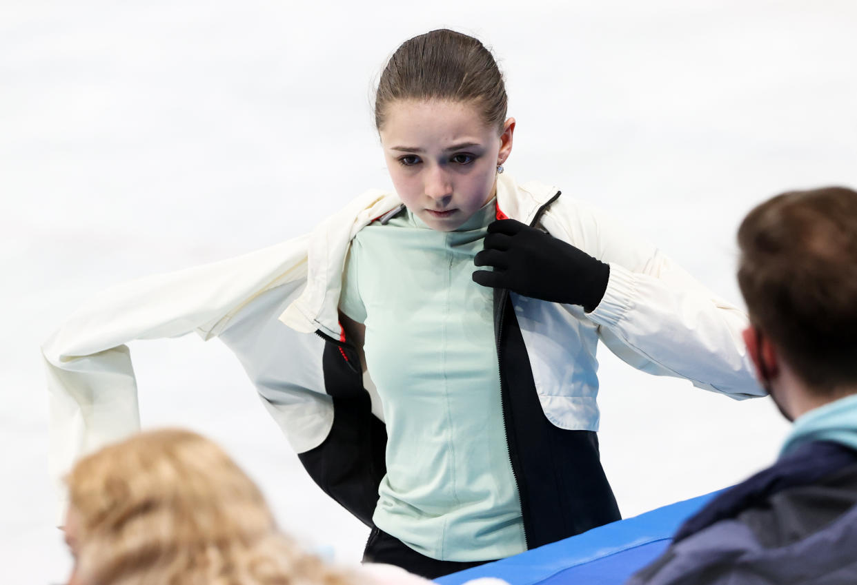 BEIJING, CHINA - FEBRUARY 16, 2022: Figure skater Kamila Valiyeva of Team ROC talks to coaches during a training session at the 2022 Winter Olympic Games, at the Capital Indoor Stadium. Valery Sharifulin/TASS (Photo by Valery Sharifulin\TASS via Getty Images)