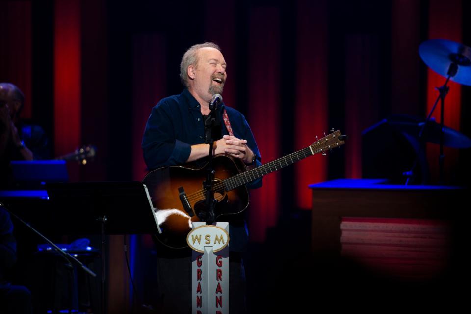 Don Schlitz reacts after being invited to become a member of the Grand Ole Opry at Grand Ole Opry House in Nashville , Tenn., Saturday, June 11, 2022.