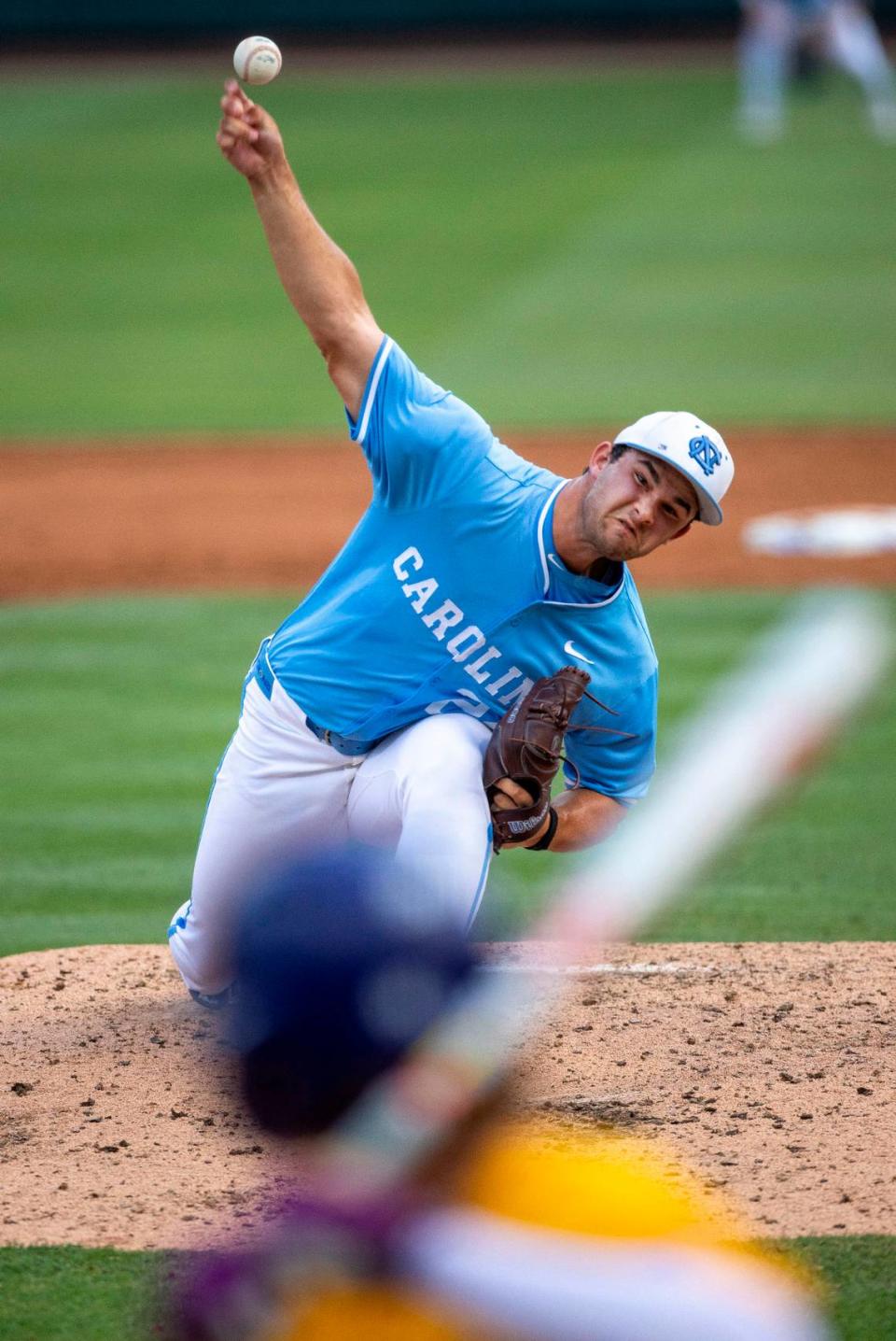 North Carolina pitcher Matthew Matthijs (24) works from the mound against LSU right fielder Ashton Larson in the fourth inning during the NCAA Regional final on Monday, June 3, 2024 at Boshamer Stadium in Chapel Hill, N.C.