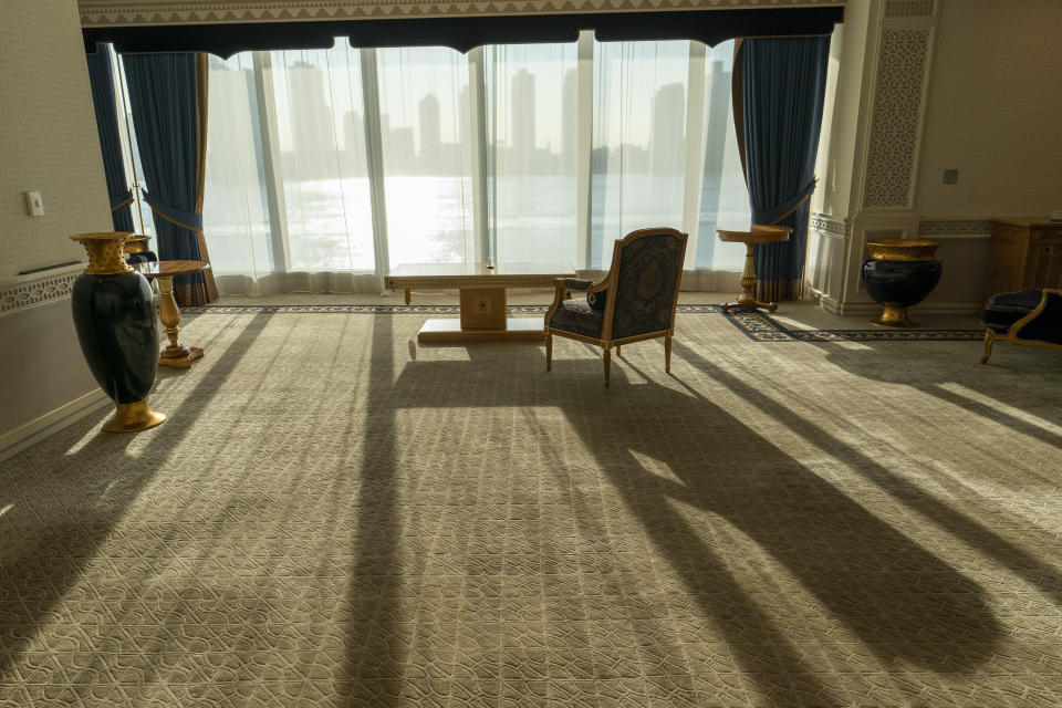 An empty chair sits in the closed East Lounge during the 75th session of the United Nations General Assembly, Wednesday, Sept. 23, 2020, at U.N. headquarters. This year's annual gathering of world leaders at U.N. headquarters will be almost entirely "virtual." Leaders have been asked to pre-record their speeches, which will be shown in the General Assembly chamber, where each of the 193 U.N. member nations are allowed to have one diplomat present. (AP Photo/Mary Altaffer)