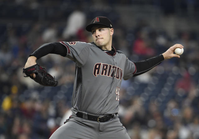 Garrett Richards of the Texas Rangers pitches against the Minnesota News  Photo - Getty Images