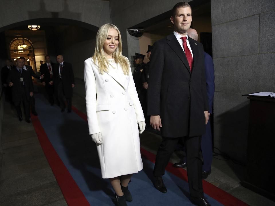 Tiffany Trump, left, and Eric Trump arrive on the West Front of the U.S. Capitol on Friday, Jan. 20, 2017, in Washington, for the inauguration ceremony of Donald J. Trump as the 45th president of the United States. (Win McNamee/Pool Photo via AP)