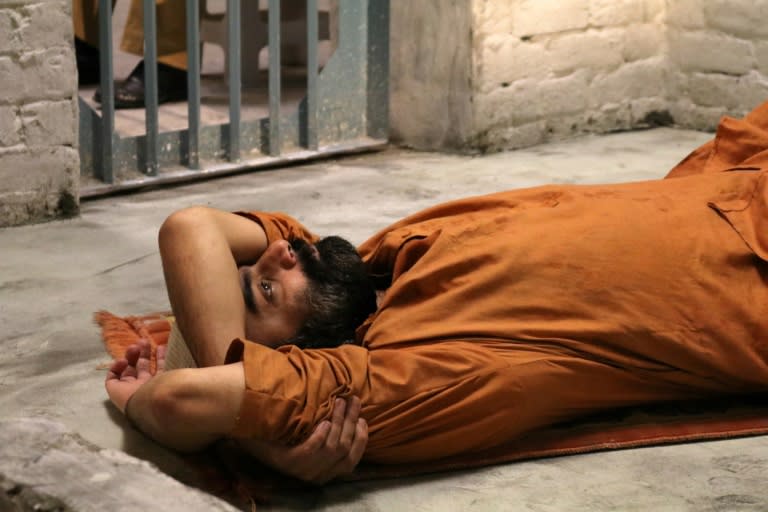 The project dubbed 'No Time to Sleep' saw actor Sarmad Khoosat embody 'Prisoner Z' in his last hours in this world This handout photo taken on October 10, 2018 and released by Justice Project Pakistan shows a performance by Pakistani artist Sarmad Khoosat during a 24-hour live performance as "Prisoner Z" in isolation, in Lahore.The project, dubbed "No Time to Sleep", saw actor Sarmad Khoosat embody "Prisoner Z", locked in isolation for his last hours in this world, in a live-streamed 24-hour performance which ended at the stroke of midnight on October 10