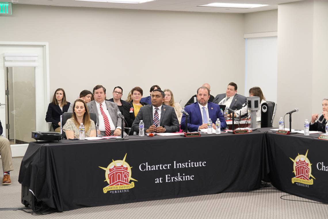 Charter Institute at Erskine CEO and Superintendent Cameron Runyan (front right) listens to a presenter Wednesday, April 17, 2024, during the district’s annual charter school application meeting.