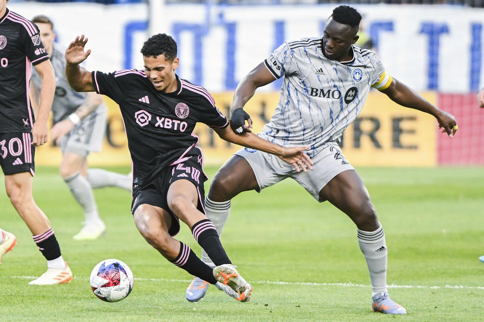 CF Montreal's Victor Wanyama, right, challenges Inter Miami's Jean Corentin during first-half MLS soccer match action in Montreal, Saturday, May 27, 2023. (Graham Hughes/The Canadian Press via AP)