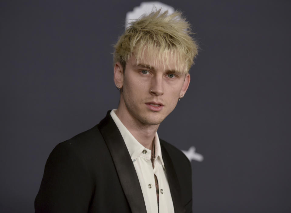 Machine Gun Kelly arrives at the InStyle and Warner Bros. Golden Globes afterparty at the Beverly Hilton Hotel on Sunday, Jan. 5, 2020, in Beverly Hills, Calif. (Richard Shotwell/Invision/AP)