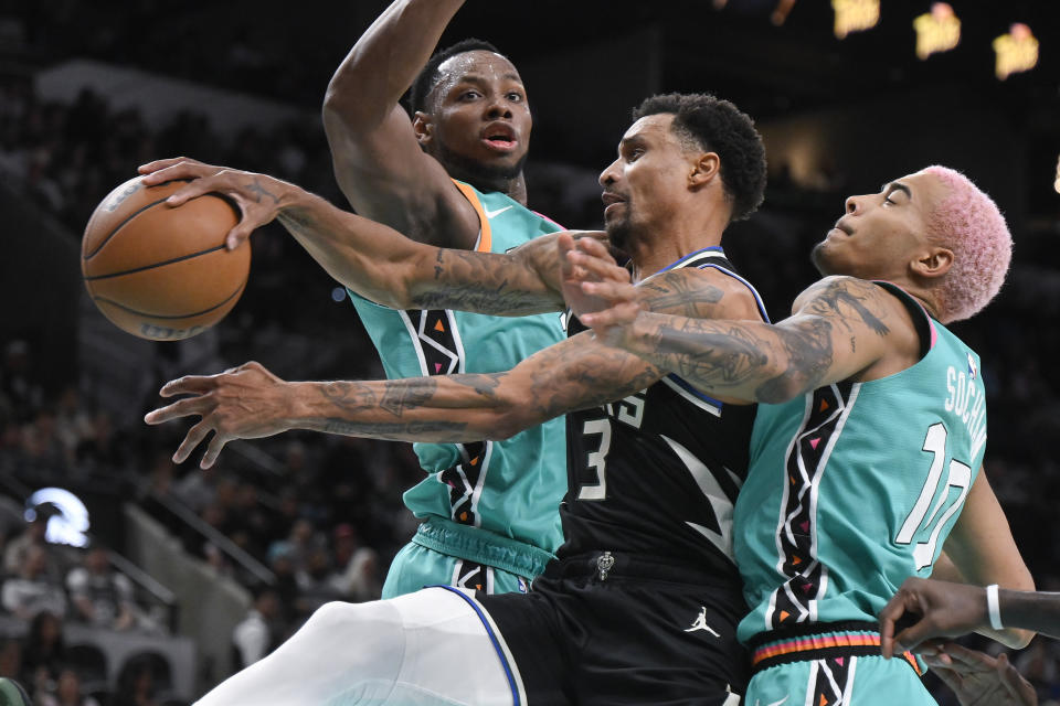 Charles Bassey and Jeremy Sochan (10) should provide fantasy value with the Spurs playing five games this week. (AP Photo/Darren Abate)