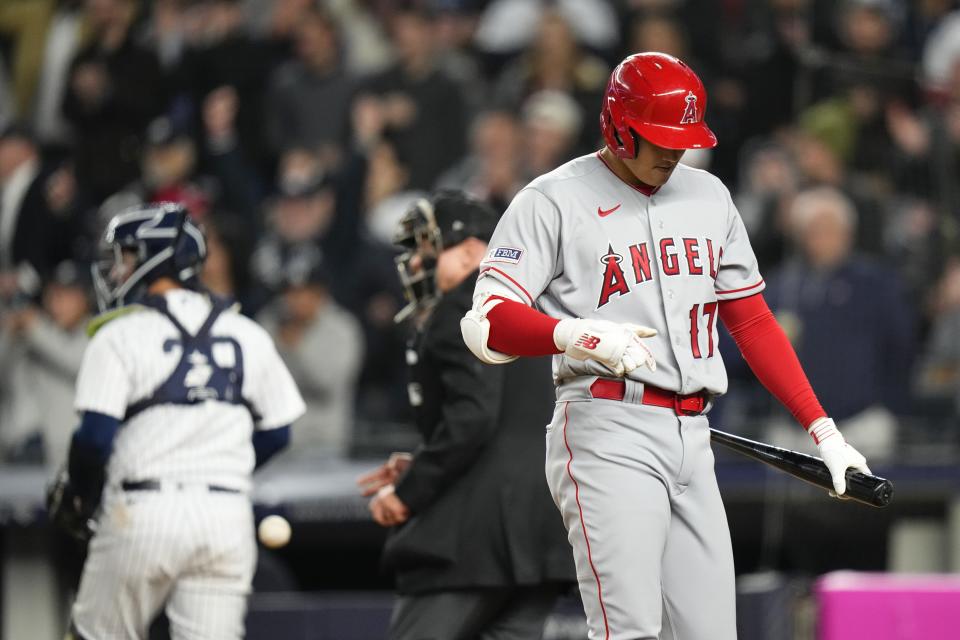 Los Angeles Angels' Shohei Ohtani reacts after striking out during the seventh inning of the team's baseball game against the New York Yankees on Wednesday, April 19, 2023, in New York. (AP Photo/Frank Franklin II)