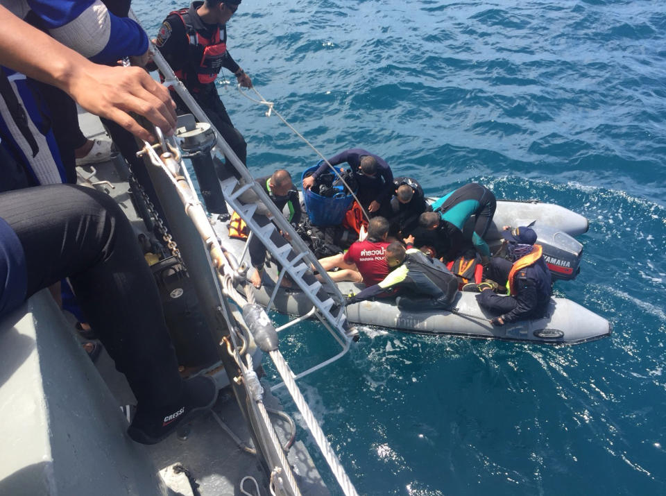 Thai divers scoured the wreckage of a boat with Chinese tourists that sank in a storm on Thursday. Source: AP