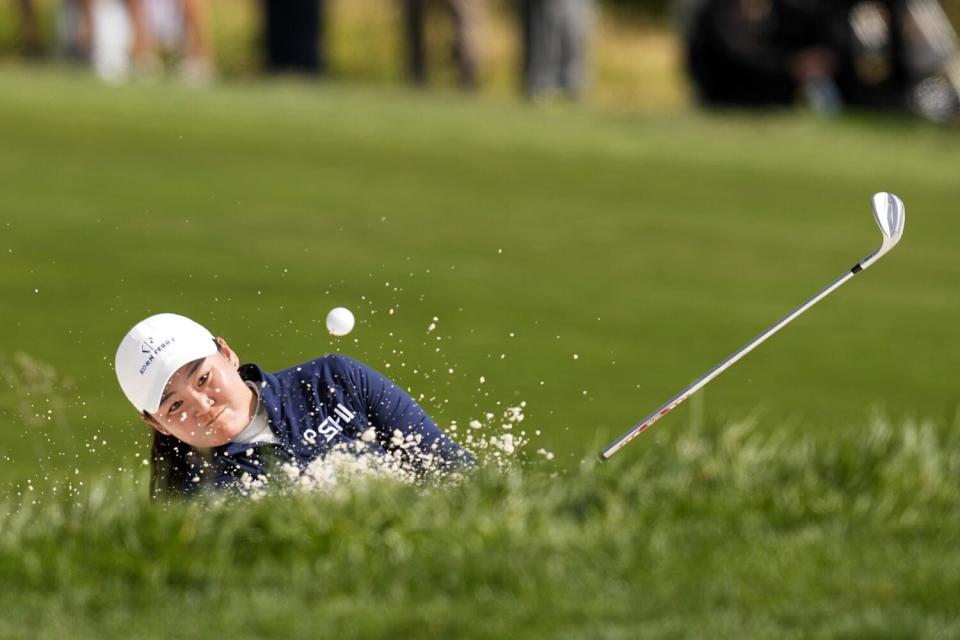 Allisen Corpuz hits from a bunker on the 12th hole during the final round of the U.S. Women's Open.