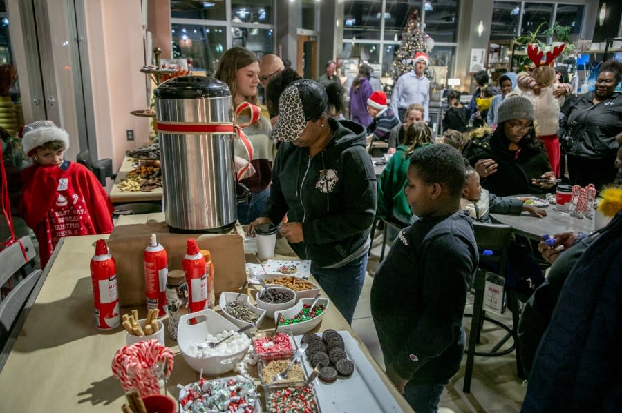 The Angel Tree Christmas Party at Talsma Furniture near Grand Rapids on Nov. 30, 2023. (Michael Buck/WOOD TV8)