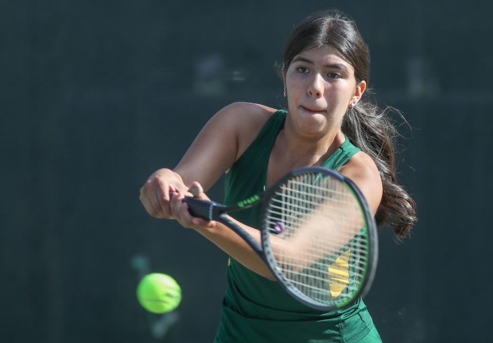 Isabella Partida-Lopez of Coachella Valley High hits a shot during her doubles match against Valley View High at Palm Valley Country Club in Palm Desert, Calif., Nov. 2, 2022.