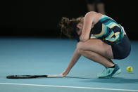 Linda Noskova of the Czech Republic reacts after defeating Iga Swiatek of Poland in their third round match at the Australian Open tennis championships at Melbourne Park, Melbourne, Australia, Saturday, Jan. 20, 2024. (AP Photo/Louise Delmotte)