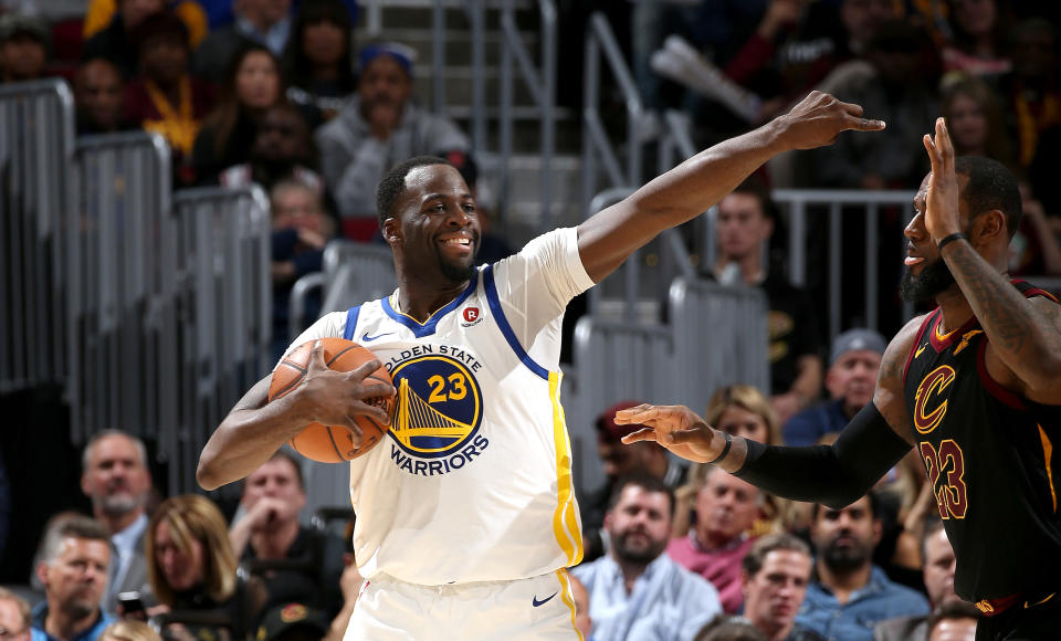 Draymond Green smiles as he sets up the Warriors’ offense Monday night against LeBron James and the Cavs. (Getty Images)