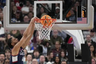 UConn guard Andre Jackson Jr. dunks in the first half of an Elite 8 college basketball game against Gonzaga in the West Region final of the NCAA Tournament, Saturday, March 25, 2023, in Las Vegas. (AP Photo/John Locher)