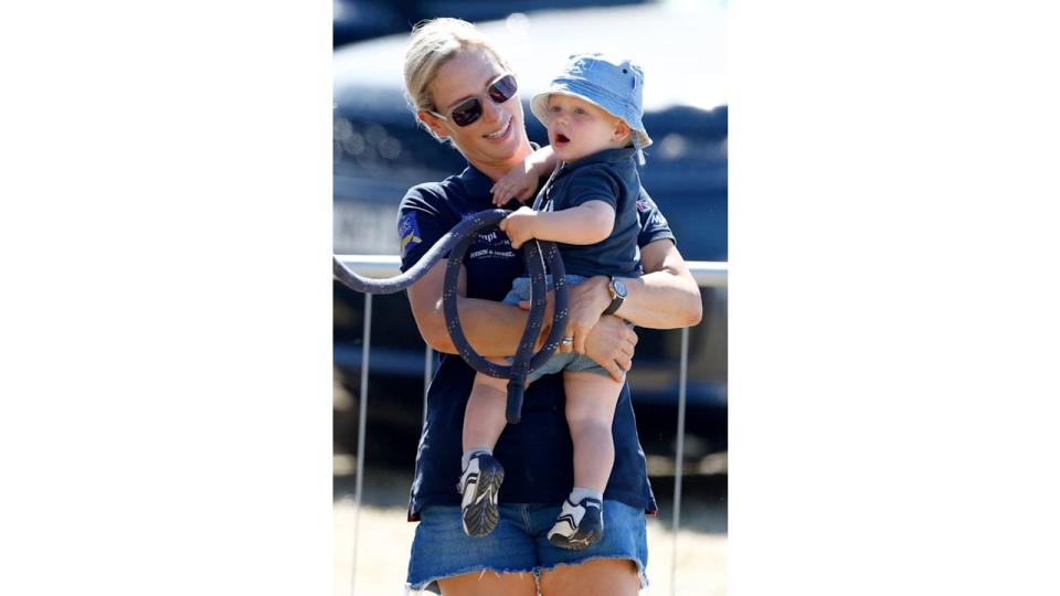 Zara Tindall holding a baby Lucas Tindall