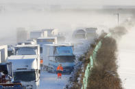 Cars are stuck on the snowy Tohoku Expressway in Osaki city, Miyagi prefecture, northern Japan, after a multiple car accident, Tuesday, Jan. 19. 2021. (Yusuke Ogata/Kyodo News via AP)