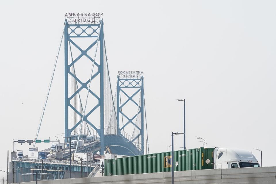 Vehicles return enter the United States from Windsor, Ontario across the Ambassador Bridge in Detroit on Monday, August 9, 2021. 