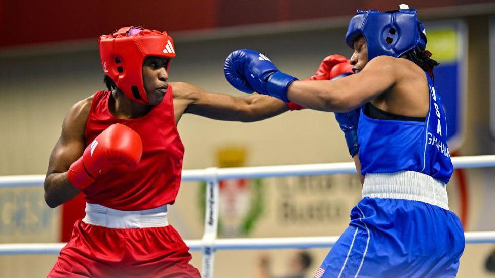 Cindy Ngamba in red aims a jab at her opponent