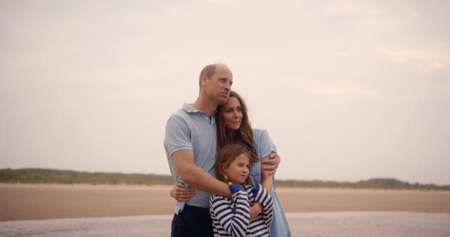 Kate, William and Charlotte hug in a still from a video message