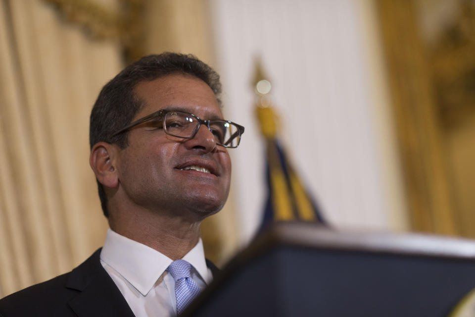 Pedro Pierluisi, sworn in as Puerto Rico's governor, speaks during a press conference, in San Juan, Puerto Rico, Friday, Aug. 2, 2019. Departing Puerto Rico Gov. Ricardo Rossello resigned as promised on Friday and swore in Pierluisi, a veteran politician as his replacement, a move certain to throw the U.S. territory into a period of political chaos that will be fought out in court. (AP Photo/Dennis M. Rivera Pichardo)