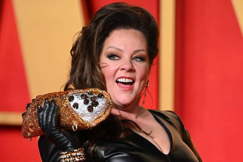 <p>Karwai Tang/WireImage</p> Melissa McCarthy with her cannoli purse at 2024 Vanity Fair Oscar Party