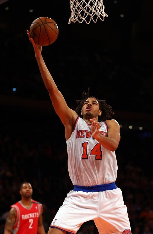 Chris Copeland of the New York Knicks heads for the net as Marcus Morris of the Houston Rockets defends on December 17, 2012 at Madison Square Garden in New York City. The Rockets defeated the Knicks 109-96. Copeland, who was starting in place of injured Carmelo Anthony, scored all of his career-best 29 points in the second half